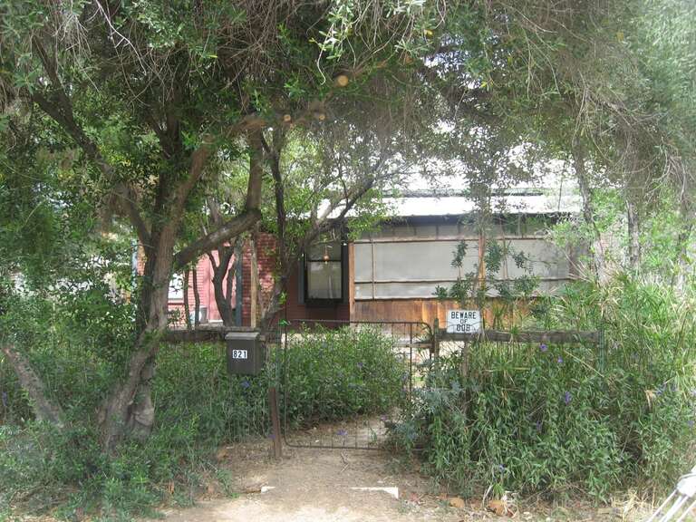 This 1908 Neo-Colonial dwelling is most famous for its occupant, Hugh Laird, local Tempe politician and business owner during Tempe's first period of serious growth from 1930-1962. It was added to the National Register of Historic Places in 1984.