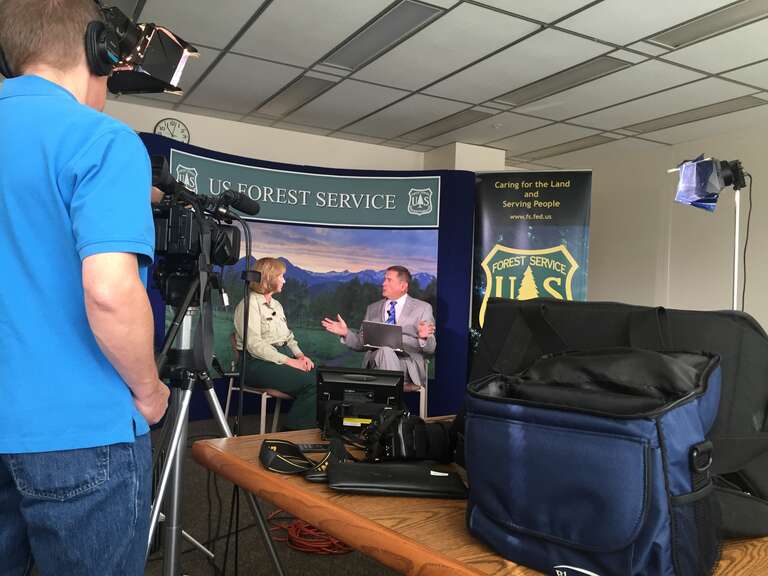 Regional Forester Nora Rasure at work representing the USFS during a TV interview. Uinta-Wasatch-Cache National Forest. Credit: US Forest Service.
