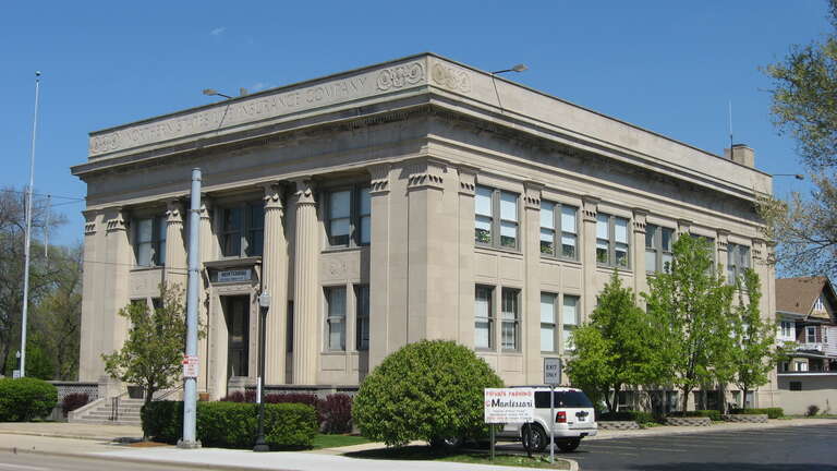 Front and southern side of the Northern States Life Insurance Company (now a Montessori school), located at 5935 Hohman Avenue in Hammond, Indiana, United States.  Built in 1926, it is listed on the National Register of Historic Places.