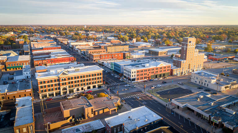 Downtown Pittsburg, Kansas drone image taken in the Fall of 2022 looking north east at Fourth and Broadway Streets.