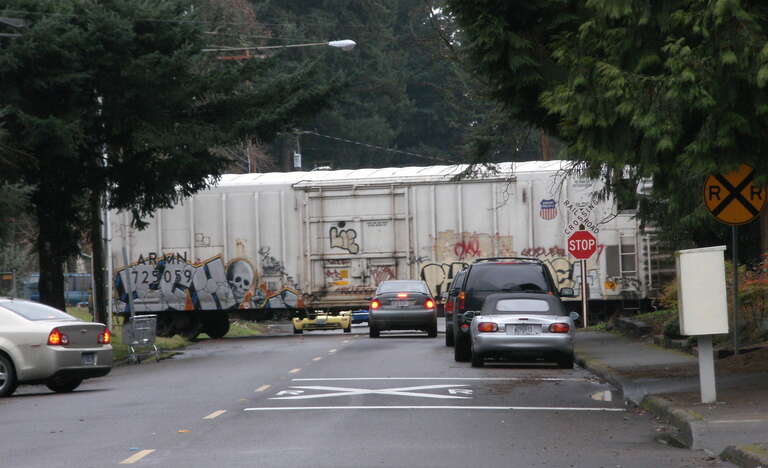 SE 7th Ave crossing in Hillsboro, Oregon. Union Pacific mechanical refrigeration car.

One summer while I was in college (Oh, so long ago.) I worked at Pacific Car and Foundry in Renton, Washington, where we were building cars similar to this one