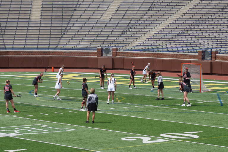 Second-half action during the Rutgers Scarlet Knights vs. Michigan Wolverines women's lacrosse game at Michigan Stadium in Ann Arbor, Michigan (United States). Rutgers won 7–6.