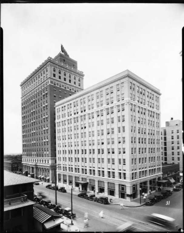 Looking at the northwest corner of 5th Street and Boulder at the Petroleum Building and Mayo Hotel.