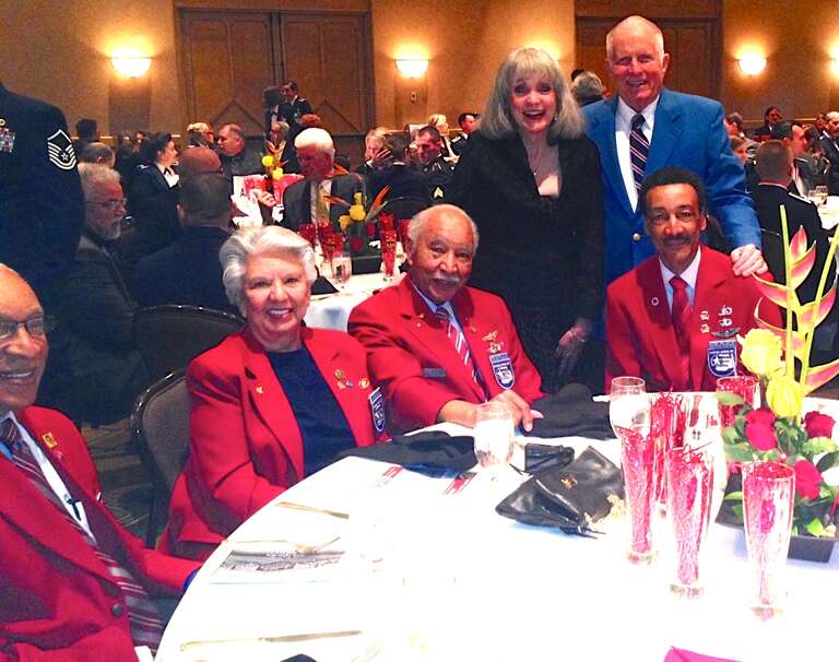 This photo was taken at the 2015 944th Fighter Wing Awards Banquet at the Wigwam Resort in Litchfield Park, AZ. Terrie Frankel, Honorary Commander to the 944th Aeromedical Staging Squadron and Fred Shinn (standing) are with David Toliver Sr. (the