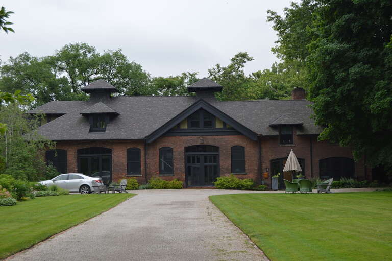 Front of the house at 2 Herrick Mews in Cleveland Heights, Ohio, United States.  Along with its neighbors, it is part of the Overlook Road Carriage House District, a historic district that is listed on the National Register of Historic Places.