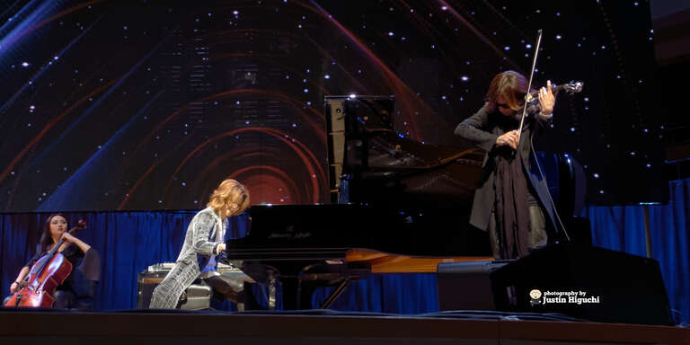 Yoshiki (of the band X Japan) performing live on the First Stop of the Yoshiki Classical World Tour at Renee and Henry Segerstrom Concert Hall in Costa Mesa California on Friday April 25th, 2014. Sugizo (of the band Luna Sea and touring member of X