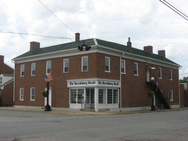 Front and eastern side of the Benjamin Passmore Hotel, located on the northwestern corner of the intersection of Main Street and Broadway in Harrodsburg, Kentucky, United States.  Built in 1843, it is listed on the National Register of Historic