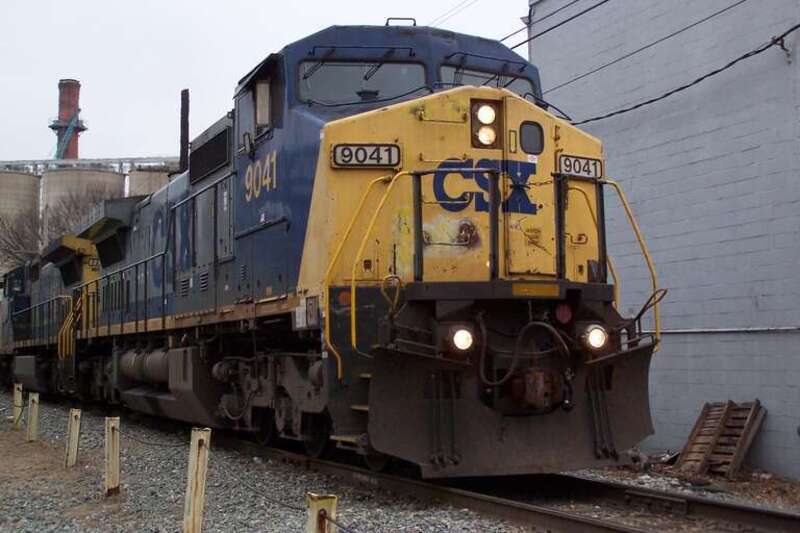 CSX 9041, a Dash9-44CW, leads a mixed freight through Charlottesville, Va.