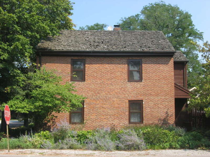 Front of the George Bentel House, located on the northeastern corner of the junction of Granary and Brewery Streets in New Harmony, Indiana, United States.  Built in 1823, it is listed on the National Register of Historic Places, and it is part of