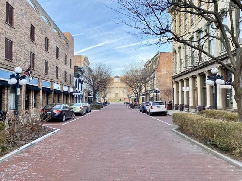 Built in 1827-1837, this Greek Revival-style building was designed by Gideon Shryock to serve as the Kentucky State Capitol.  The building is clad in marble with a hexastyle front portico at the top of a set of front steps with fluted ionic columns,