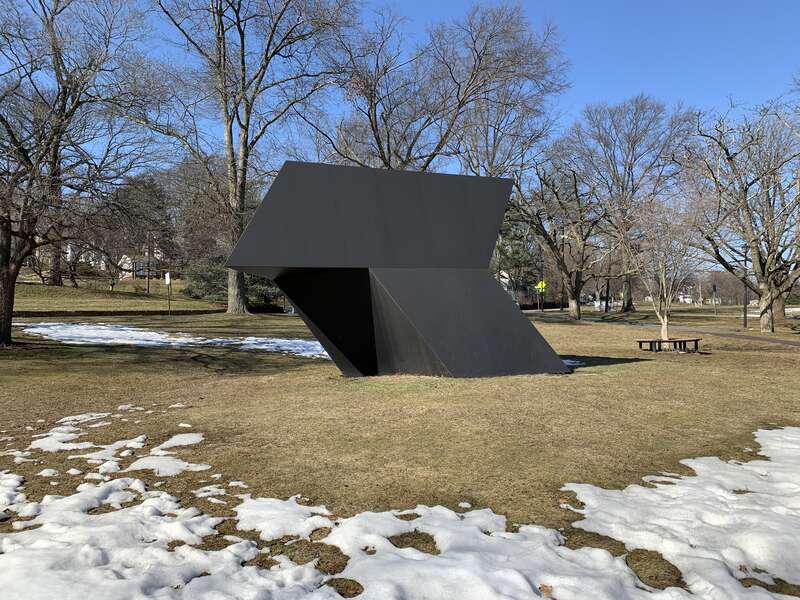 TAU Tony Smith (1961-62). Fabricated 2005. Installed 2008. Black painted steel, 14 ft x 12 ft. Located in Meadow Park in South Orange, New Jersey.
