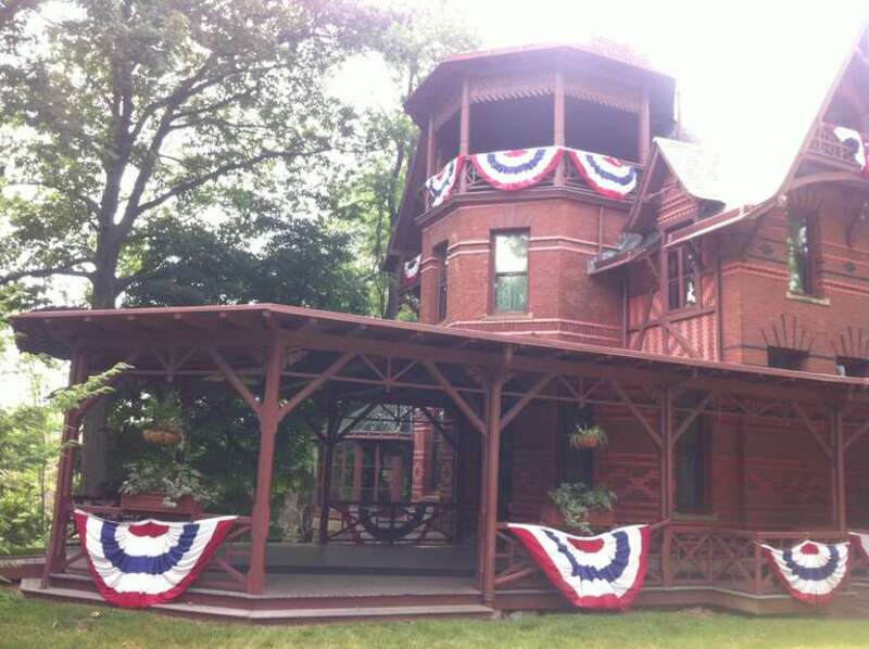 Side picture of The Mark Twain House and Museum decorated for the 4th of July (American Independence Day celebration) in Hartford, CT