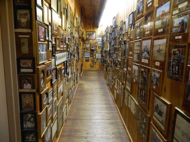 The hall of pictures inside Wall Drug.  Dan Quayle is up here!