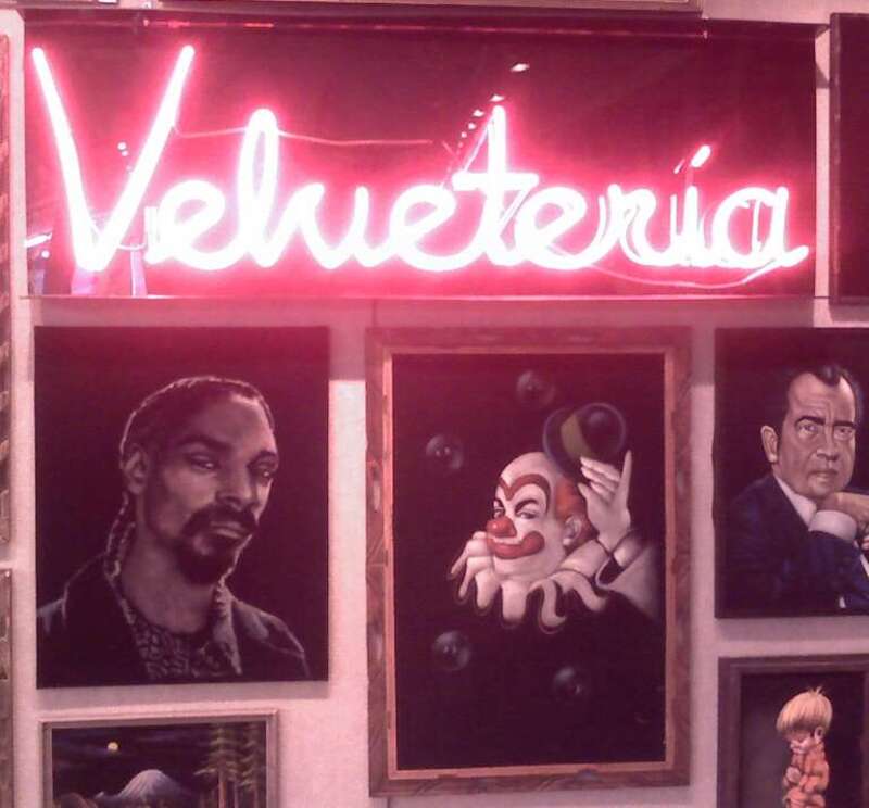 Part of a great display of velvet paintings at Powell's Books right now.  
Update: There is a museum on Burnside in Portland, and it was well worth the $5.  But then, my wild-livin' aunt gave me a black light velvet cobra poster when I was five and