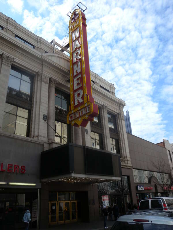 Looking west at Warner Centre on a mostly sunny midday.