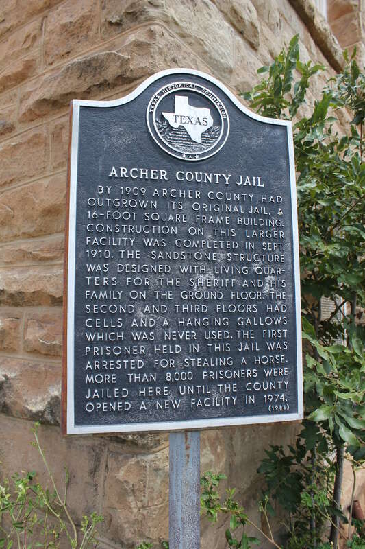 By 1909 Archer County had outgrown its original jail, a 16-foot square frame building. Construction on this larger facility was completed in Sept. 1910. The sandstone structure was designed with living quarters for the sheriff and his family on the