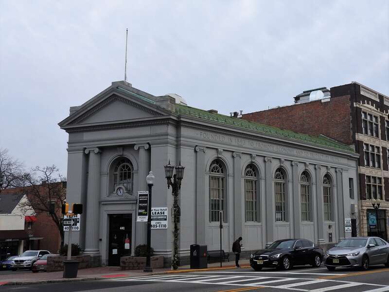 Looking east across Bloomfield Avenue at former Montclair Savings Bank, later Bank of America, now vacant, on a cloudy day