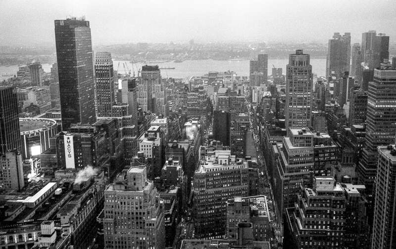 500px provided description: City Heights [#sky ,#city ,#street ,#travel ,#light ,#buildings ,#urban ,#architecture ,#cityscape ,#film ,#ny ,#building ,#black and white ,#new york city ,#bnw ,#manhattan]