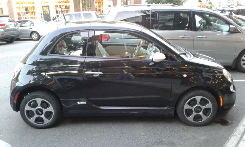 Electric Fiat 500e parked on Main Street in Hanover, New Hampshire.