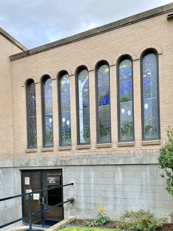 Built in 1921, this stripped and stark Romanesque Revival-style church, home to a Presbyterian congregation, stands at the corner of Central Avenue and 3rd Street in downtown Whitefish, Montana.