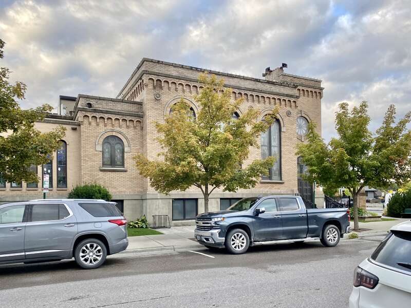 Built in 1921, this stripped and stark Romanesque Revival-style church, home to a Presbyterian congregation, stands at the corner of Central Avenue and 3rd Street in downtown Whitefish, Montana.