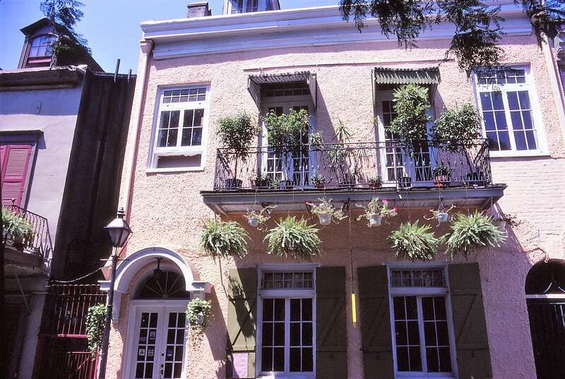 In June 1985, we visited New Orleans.
An attractive wrought iron balcony with ferns in the French Quarter.