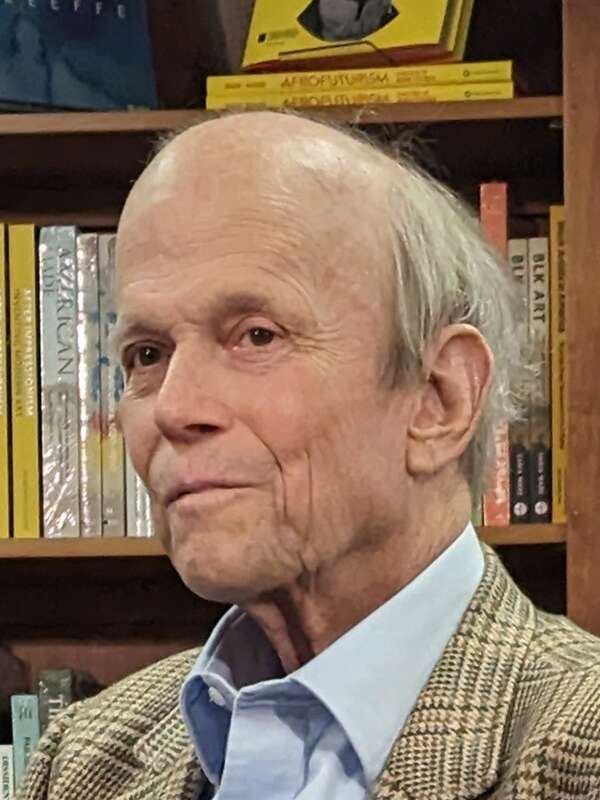 Journalist Landon Jones being introduced for a book talk at Politics and Prose.