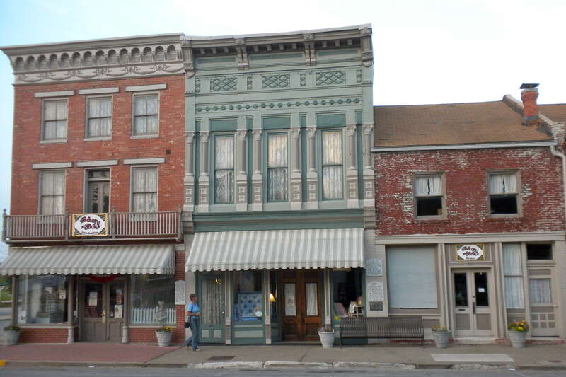 Buildings in Mark Twain Historic District	.  The district, which has been on the NRHP since January 4, 1978, is on Bird, Main, and Hill Sts., Hannibal, Missouri, near Samuel Clemens's boyhood home.  These particular buildings are on the SE corner of