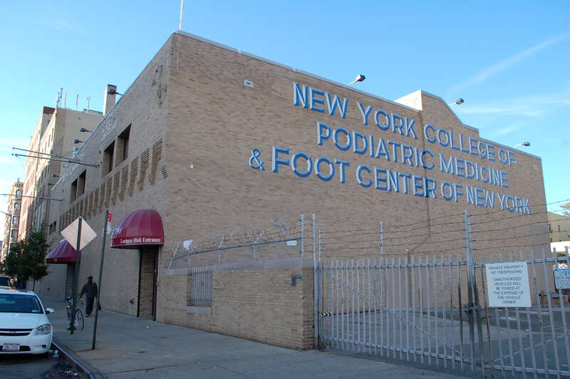 Looking northwest at New York College of Podiatric Medicine on East 124th Street in New York City.  ZIP code 10035.