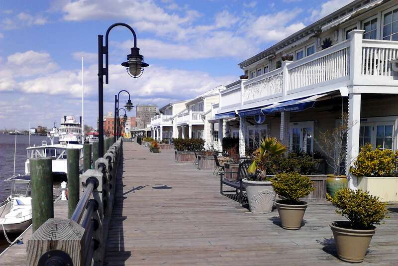 The Wilmington Riverwalk in North Carolina along the Cape Fear River.