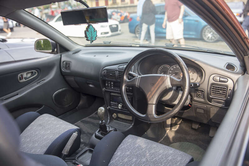 1995 Mitsubishi Mirage Cyborg R interior at a Caffeine &amp;amp; Carburetors event in New Canaan, CT. 175hp (JIS) MIVEC engine. Black, aftermarket wheels and failing clearcoat means no exterior pictures.