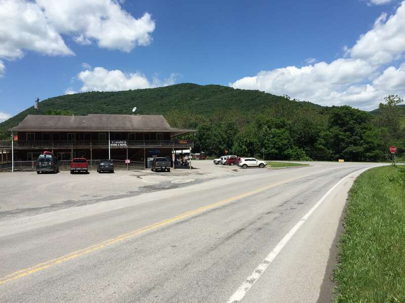 View west along U.S. Route 33 and north along West Virginia State Route 28 (Mountaineer Drive) at the junction with West Virginia State Route 55 in Seneca Rocks, Pendleton County, West Virginia