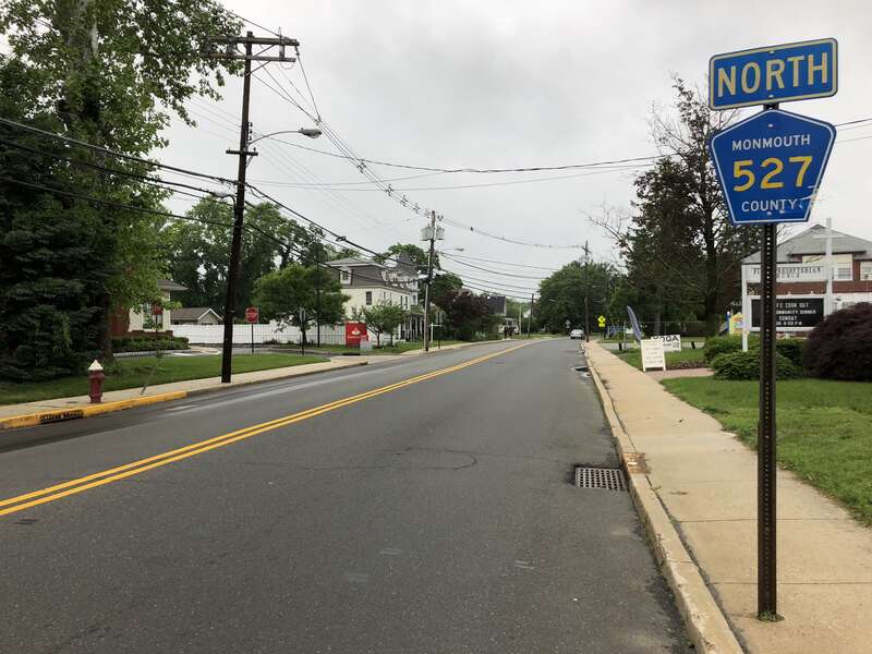 View north along Monmouth County Route 527 (Main Street) at Monmouth County Route 522 (Wood Avenue) in Englishtown, Monmouth County, New Jersey