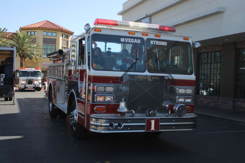 Engine 1 of the Angel Fire Department (a charity organization) returning to Town Square shopping mall during the Las Vegas Ride for Kids in 2019. Ride for kids is a nation-wide event that raises money for the Pediatric Brain Tumor Foundation.