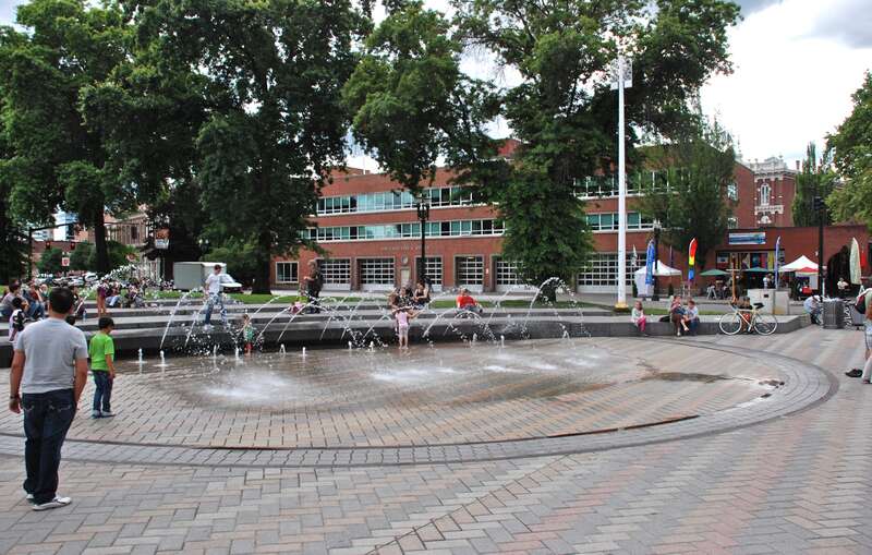 The Bill Naito Legacy Fountain, in Portland's Tom McCall Waterfront Park, viewed from the northeast (looking southwest, towards Naito Parkway and downtown).  Named in honor of the late Bill Naito, the fountain was constructed and brought into use in
