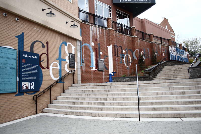 Stairs in Blue Back Square between the library and the cinema, decorated with Blueback Speller imagery