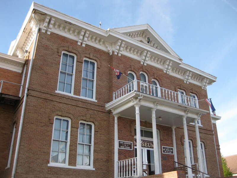 Exterior of the former Custer County Courthouse, located at 411 Mount Rushmore Road in downtown Custer, South Dakota, United States.  Built in 1881, the courthouse (now a museum) is listed on the National Register of Historic Places.