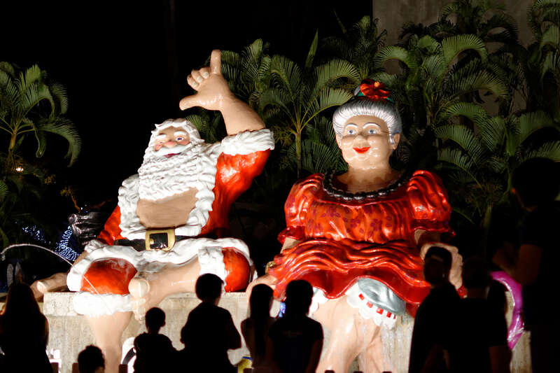 People watching Santa and Mrs Claus