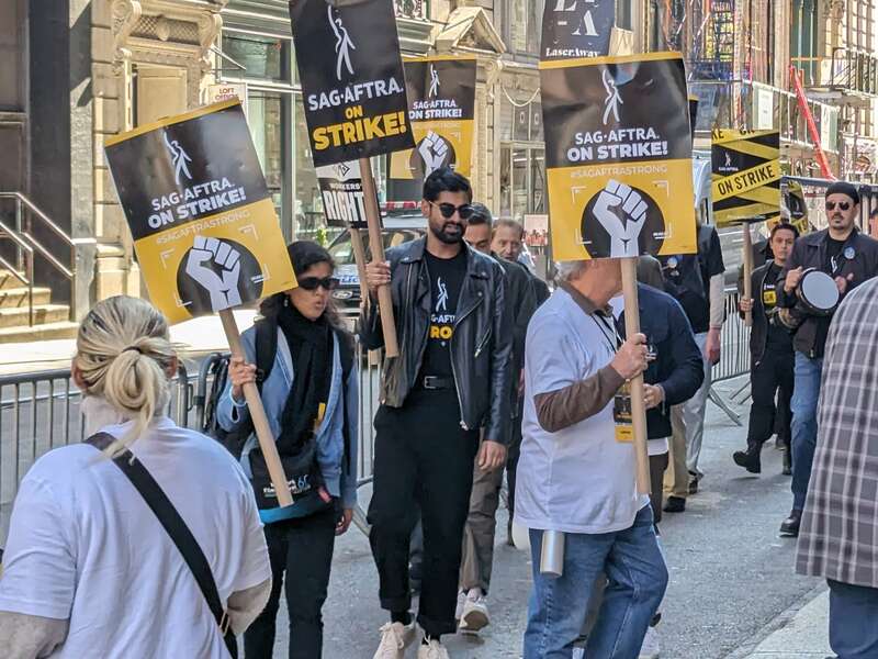 Though the Writers Guild has reached a tentative deal with the studios, the Screen Actors Guild are still on strike and continue to walk the picket line in front of Netflix's New York offices.