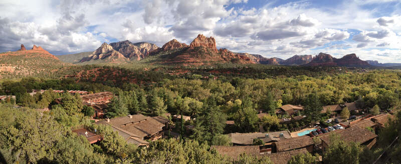 A panoramic view of red rock formations in Sedona, Arizona