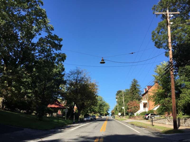 View &quot;south&quot; (actually west) along U.S. Route 340 Alternate (Washington Street) at Columbia Street in Harpers Ferry, Jefferson County, West Virginia