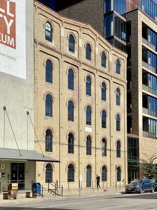 Built in 1878, this Italianate-style mill building was built as the Humboldt Flour Mill for the Bull and Newton milling company, and was later purchased by the adjacent Washburn-Crosby Mill, which renamed it the Washburn-Crosby E Mill.  The building