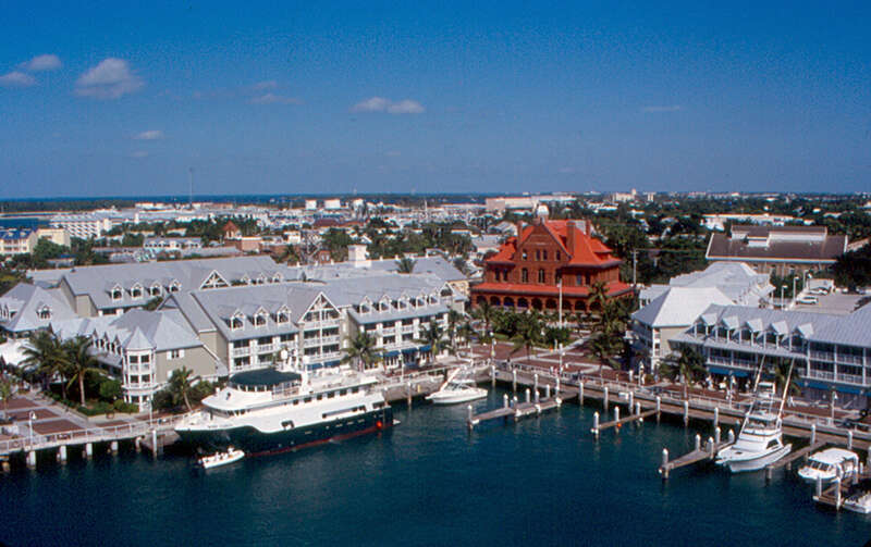 Looking to the center of Key West from the cruise ship.  The large red building is the old Customs House and post office, now a museum.  It was built in 1889-1891.  The Westin Hotel is at left.