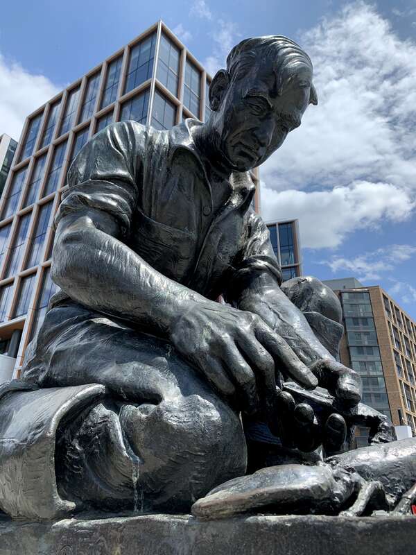 The Maine Lobsterman sculpture was made by Victor B. Kahill in 1939. Elroy Johnson was the model. The sculpture is located on the Southwest Waterfront in Washington, D.C.