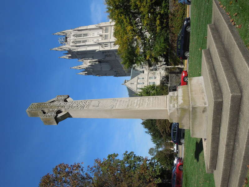 The Peace Cross, erected 1898, on the grounds of the Washington National Cathedral; the cathedral in the background