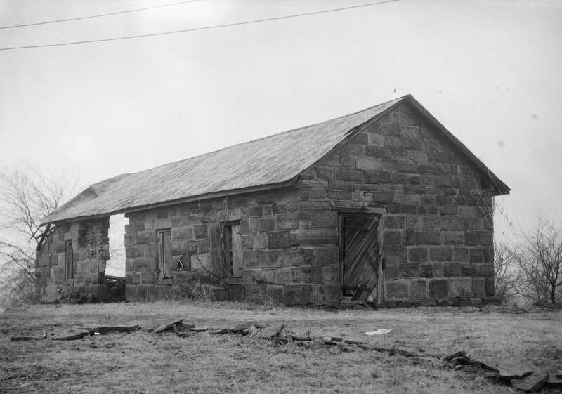 Front and side of the Post Blacksmith Shop, located on the grounds of Fort Gibson in Fort Gibson, Oklahoma, United States.  Built in 1867, it is listed on the National Register of Historic Places.