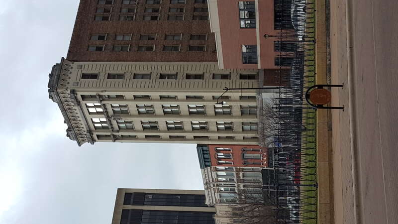 Photo featuring buildings of the Springfield, Illinois skyline: the Reisch Building in the forefront.