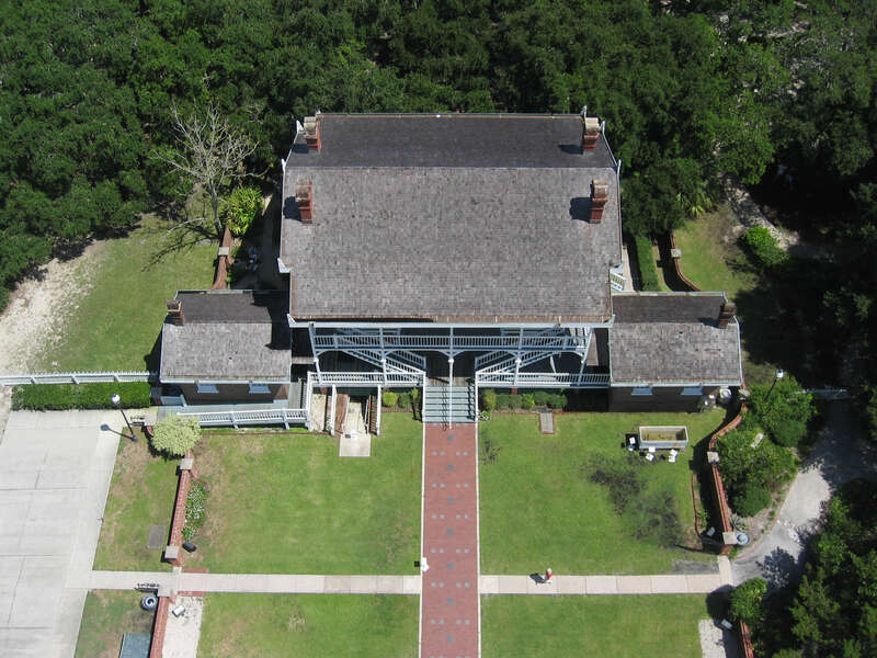 Photo of the St. Augustine Lighthouse outbuildings looking down from the top of the lighthouse tower in St. Augustine, Florida, USA.