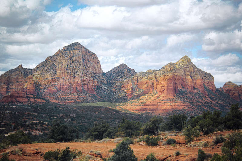 500px provided description: Thunder Mountain in Sedona, AZ [#sky ,#landscape ,#clouds ,#arizona ,#sandstone ,#sedona ,#red rock ,#rock formation ,#thunder mountain]