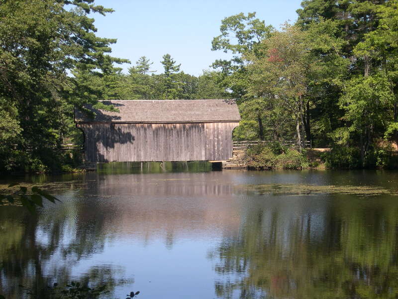 A replica of a Vermont covered bridge, this beauty transverses the Quinebaug River. The river gave power to the mills in Old Sturbridge Village for many years.